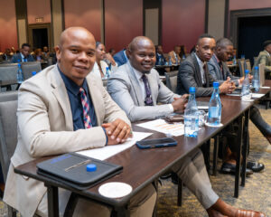 A row of business owners seated at a table during the Owners Conference before the South Africa Awards Gala in March 2025
