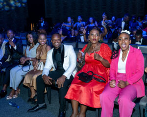 Members of the audience smile from their seats at the South Africa Awards Gala in March 2025