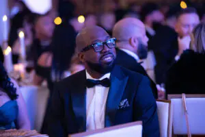 National Consultant Eric Martin watches the awards ceremony at the 2026 Limitless Kickoff Gala